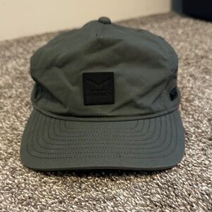 Melin Odysea Stacked Thermal Waxed SnapBack in Surplus Green, Small